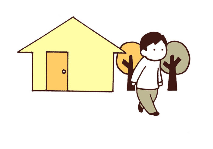 一人で外を歩いている男性